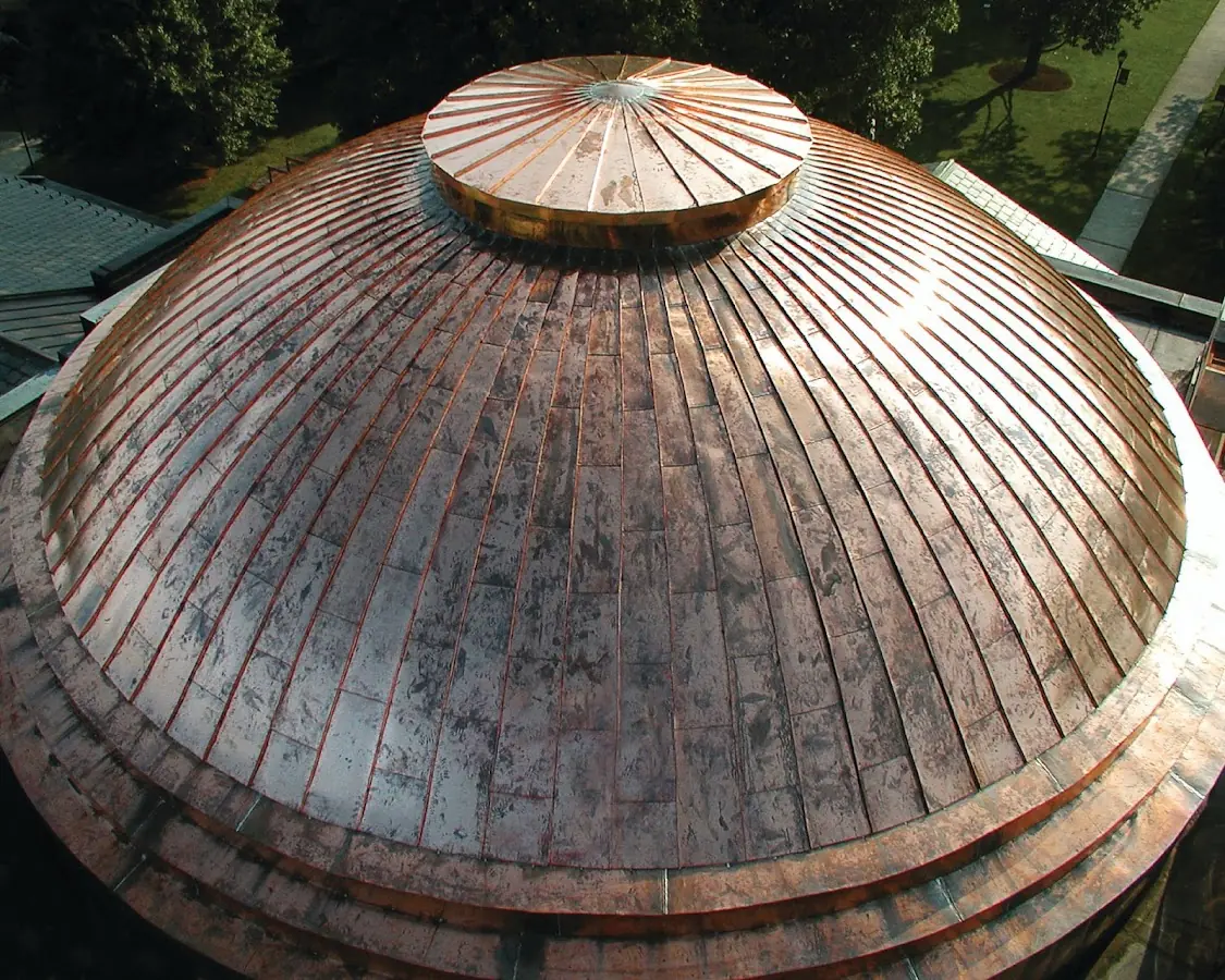 Craftsman Roofing crew installing a new roof in Hinmansville